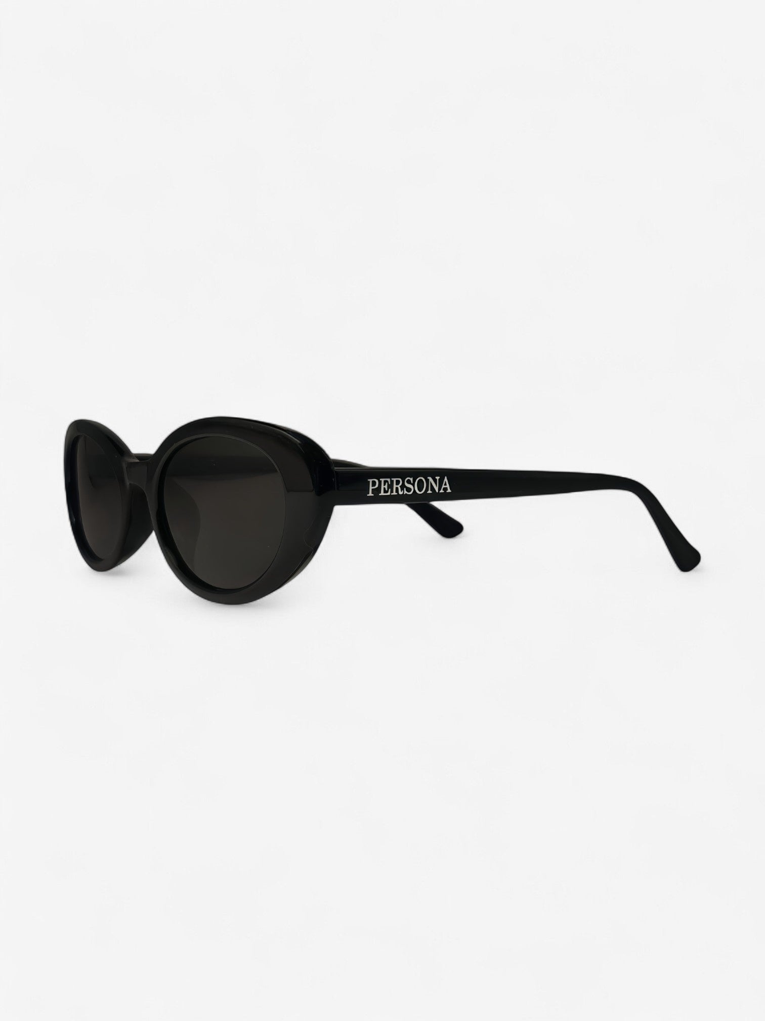 Angled shot of black cat eye sunglasses - retro unisex design