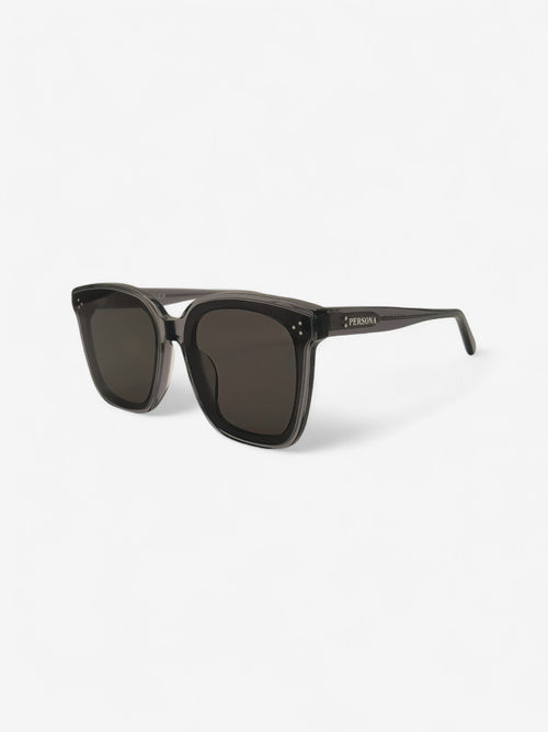 Angled shot of grey square sunglasses - contemporary unisex style