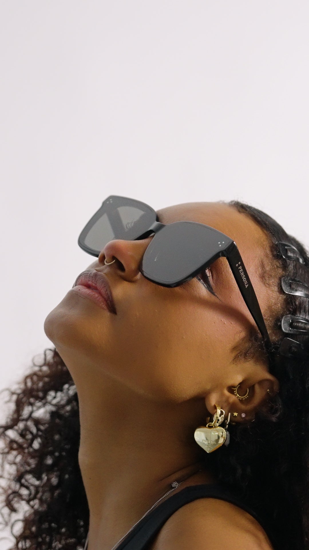 Profile view of woman in Charmer sunglasses - polished acetate frames 
